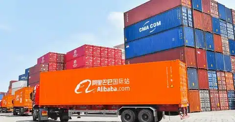 Alibaba truck transporting shipping containers for international sea freight.