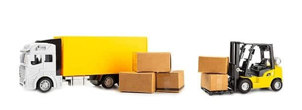 “Forklift loading boxes into truck representing cargo handling and CFS fees in shipping”